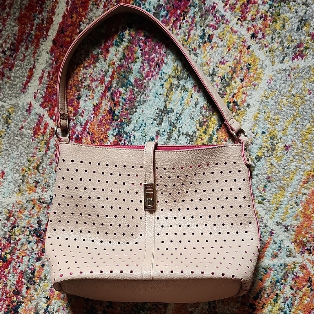 Carpisa bucket bag with perforated design